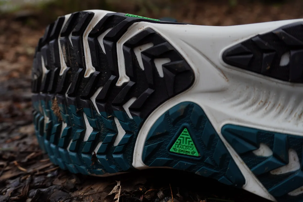 trail running shoes on pavement